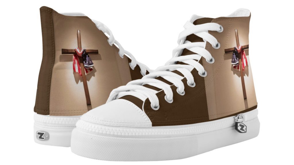 Photo of sneakers with a cross and American flag