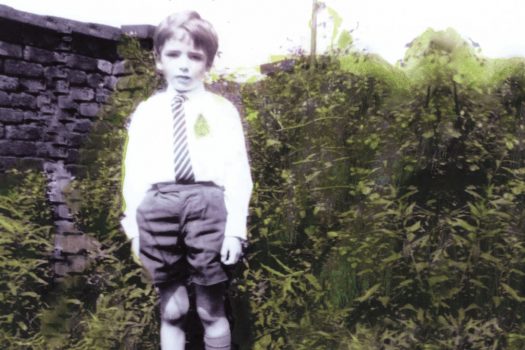 Photo of Mark Dowd as a young boy, as featured on the cover of his new book, Queer and Catholic