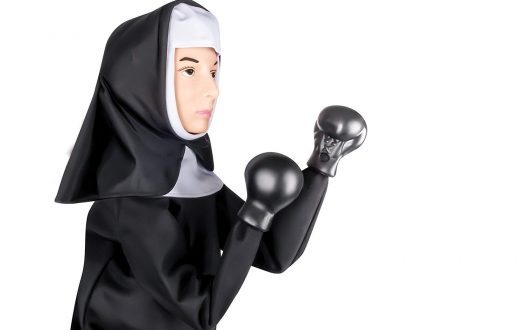 Photo of punching nun glove puppet